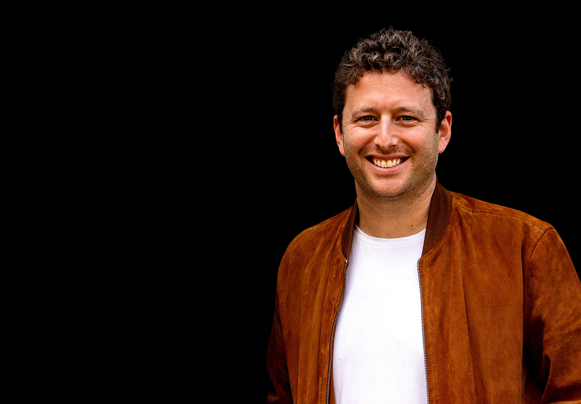 Adam-Jacobs-Brown-Jacket-Only-Speaker-B-1920X1336